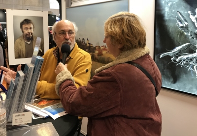 Henri Clément during an interview Salon de la Photo